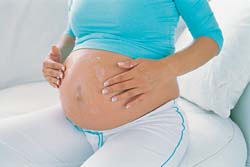 Боротьба з розтяжками по триместрах вагітності